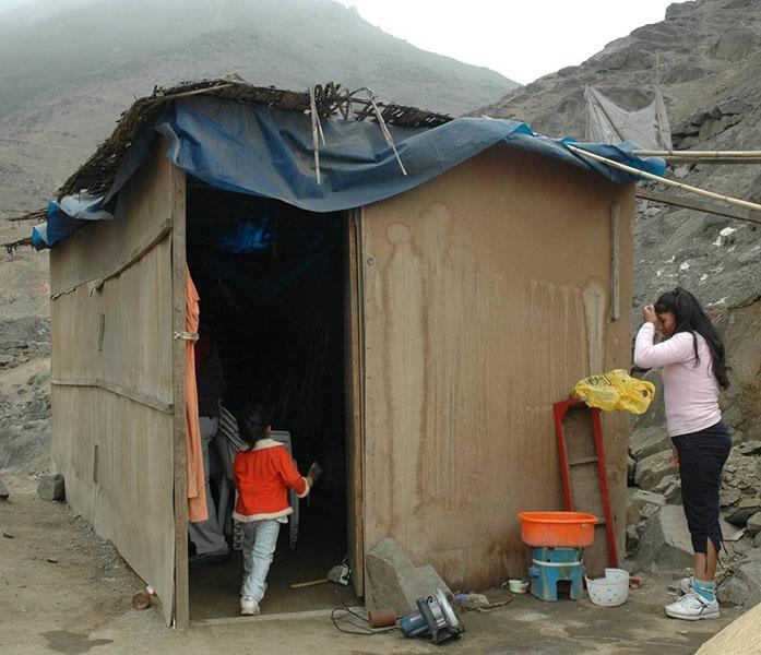 Home of young woman and child in Collique, Peru